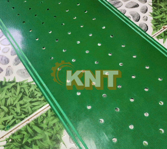 Dây băng tải pvc xanh đục lổ móc rảnh Kim Ngân Thịnh